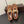 ALAIA BALLET FLATS IN COPPER BROWN MESH FISHNET WITH GOLD HARDWARE