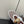 ALAIA BALLET FLATS IN WHITE MESH FISHNET WITH GOLD HARDWARE
