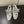 ALAIA SPHERE BALLET FLATS IN SILVER LAMBSKIN