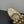 ALAIA SPHERE BALLET FLATS IN GOLDEN LAMBSKIN