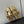 ALAIA SPHERE BALLET FLATS IN GOLDEN LAMBSKIN