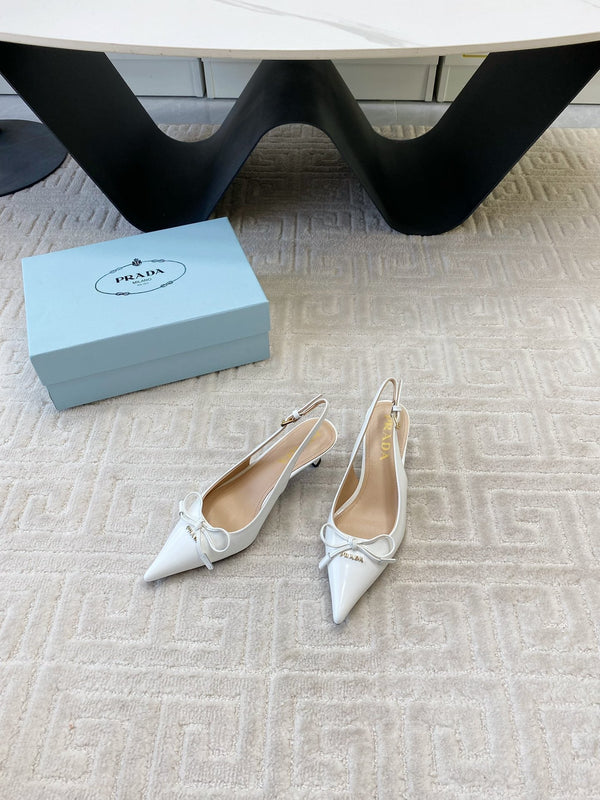 DÉCOLLETÉ SLINGBACK CON FIOCCO IN PELLE DI VITELLO LUCIDA BIANCA