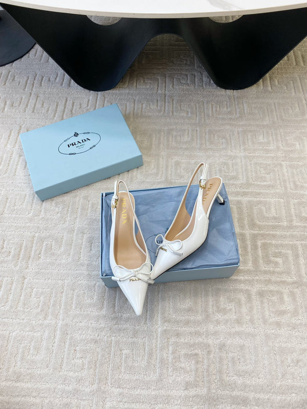 DÉCOLLETÉ SLINGBACK CON FIOCCO IN PELLE DI VITELLO LUCIDA BIANCA