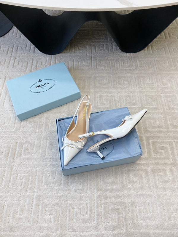 DÉCOLLETÉ SLINGBACK CON FIOCCO IN PELLE DI VITELLO LUCIDA BIANCA