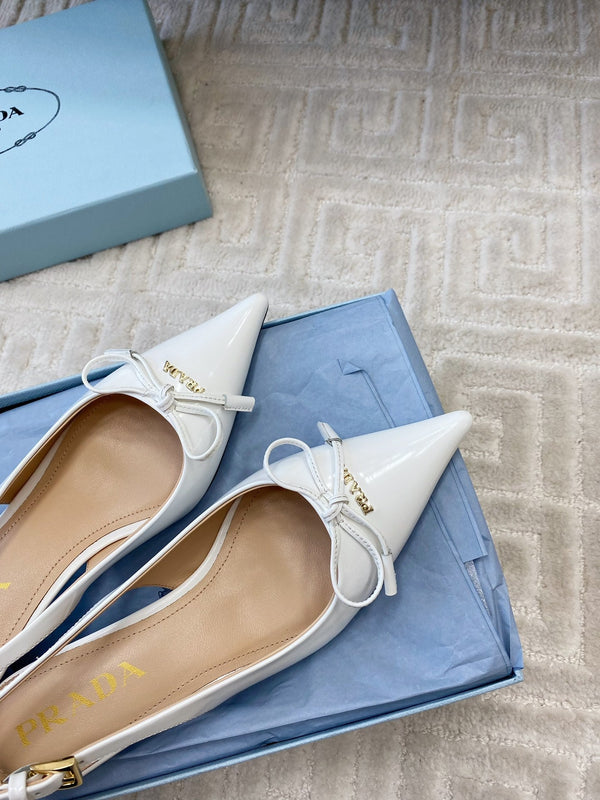 DÉCOLLETÉ SLINGBACK CON FIOCCO IN PELLE DI VITELLO LUCIDA BIANCA