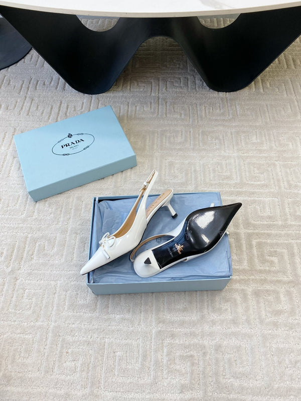 DÉCOLLETÉ SLINGBACK CON FIOCCO IN PELLE DI VITELLO LUCIDA BIANCA
