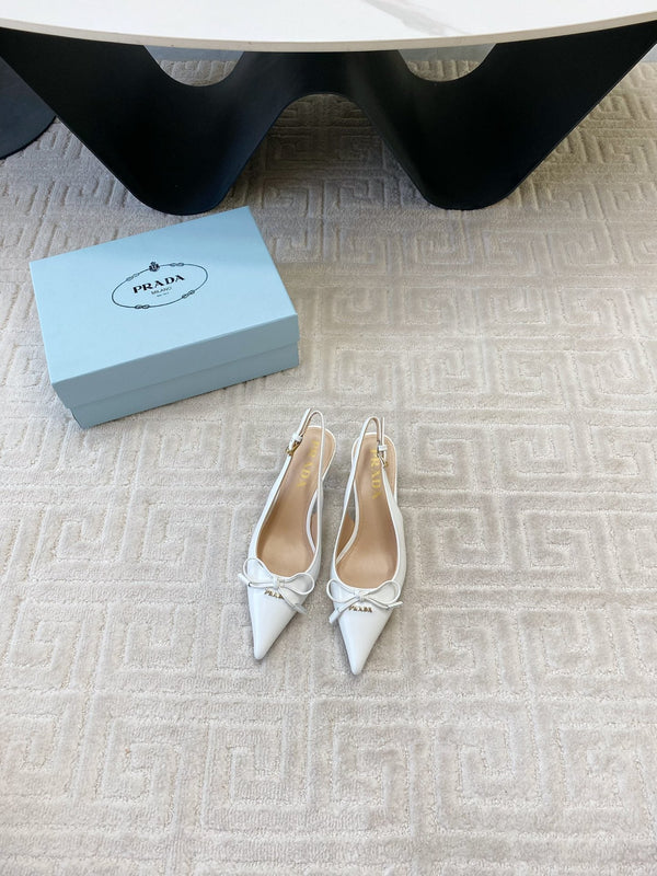 DÉCOLLETÉ SLINGBACK CON FIOCCO IN PELLE DI VITELLO LUCIDA BIANCA