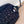 Cardigan en laine noire Chanel 2025 avec embellissement en strass