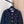 Cardigan en laine noire Chanel 2025 avec embellissement en strass