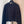 Cardigan en laine noire Chanel 2025 avec embellissement en strass