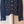 Cardigan en laine noire Chanel 2025 avec embellissement en strass