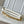 COUSSIN PM 26 IN WHITE BLUE MONOGRAM EMBOSSED LAMBSKIN GOLD HARDWARE
