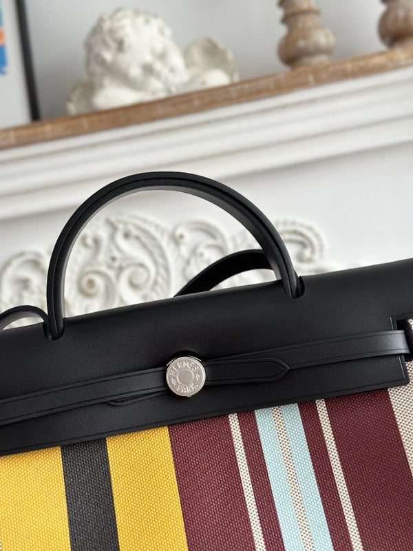 BORSA HERBAG ZIP 31 LACCATA IN TELA MARRONE MIX GIALLO H PLUME