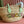 SMALL TOTE BAG 26 WITH LOGO IN NATURAL-COLORED STRAW AND LIGHT GREEN CALFSKIN HANDLE