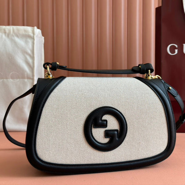 Borsa Gucci Blondie 32 in pelle nera e bianca, tela 239898
