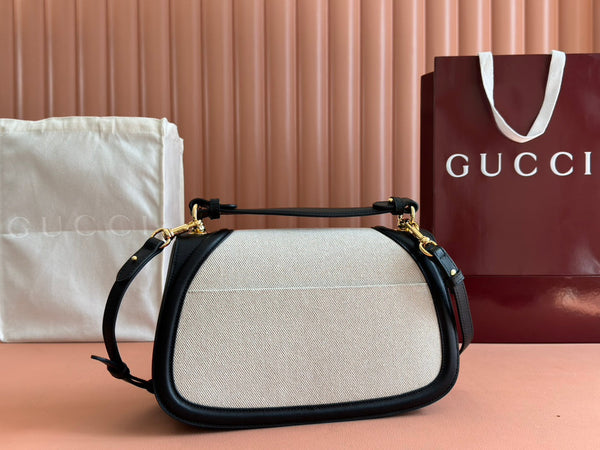 Borsa Gucci Blondie 32 in pelle nera e bianca, tela 239898