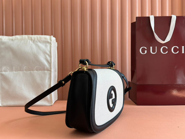 Borsa Gucci Blondie 32 in pelle nera e bianca, tela 239898