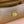 CHAIN SHOULDER BAG 24 IN PEANUT BROWN PATENT SMOOTH CALFSKIN