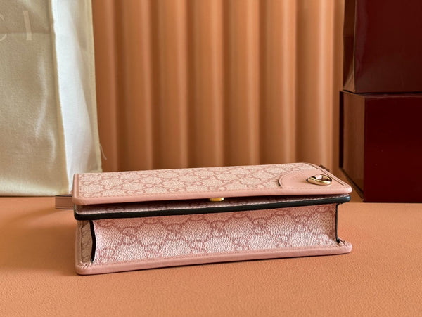 Borsa a tracolla Gucci Emblem Mini in tela e pelle rosa 244541