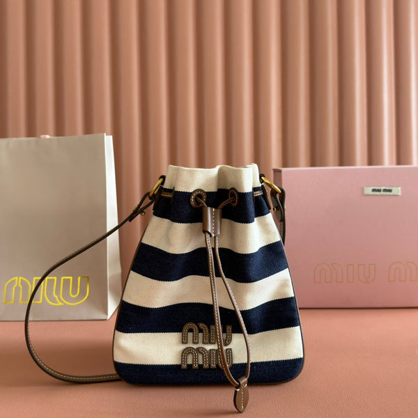 Sac seau rayé Miu Lucky en toile noire et crème
