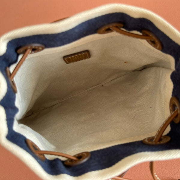 Sac seau rayé Miu Lucky en toile noire et crème