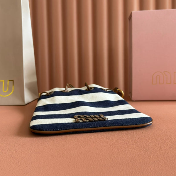 Sac seau rayé Miu Lucky en toile noire et crème