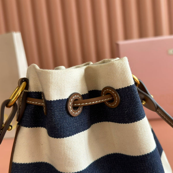 Sac seau rayé Miu Lucky en toile noire et crème
