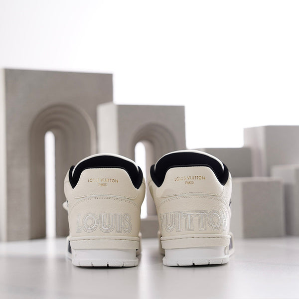 SNEAKER LV TRAINER IN PELLE DI VITELLO BIANCA E CAMOSCIO NERO