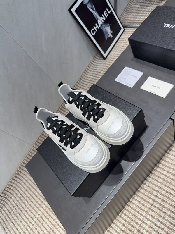 Chanel 25 Sneaker Black White Suede 540306