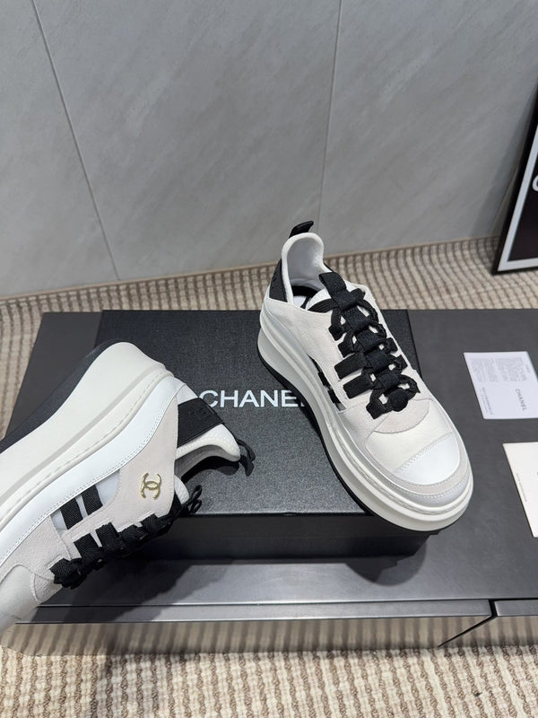 Chanel 25 Sneaker Black White Suede 540306