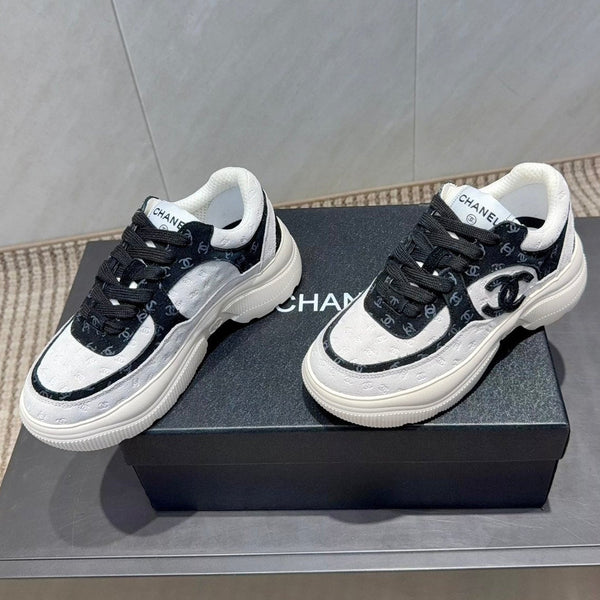 Chanel 25 Sneaker Black White Suede 540329