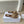 ALAIA FLAT MULE IN BEIGE CREAM SUEDE