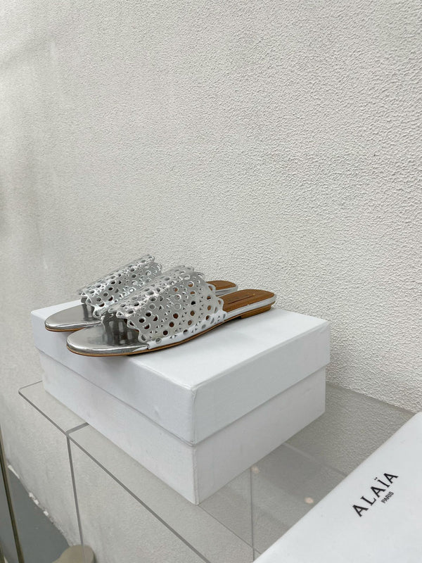 MULES PIATTI ALAIA VIENNE IN AGNELLO ARGENTO