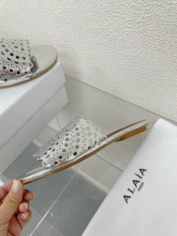 MULES PIATTI ALAIA VIENNE IN AGNELLO ARGENTO