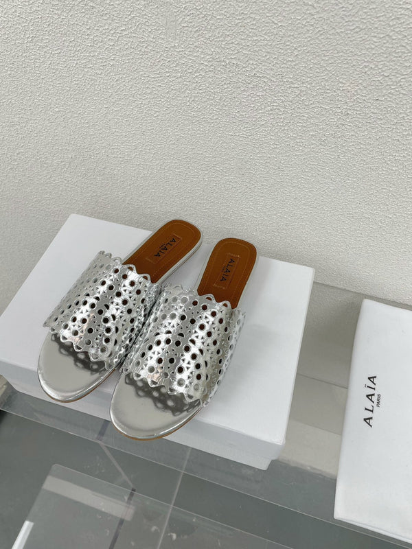 MULES PIATTI ALAIA VIENNE IN AGNELLO ARGENTO