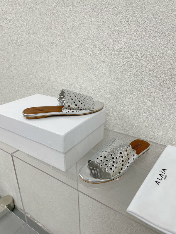 MULES PIATTI ALAIA VIENNE IN AGNELLO ARGENTO