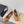 ALAIA BALLET FLATS IN COPPER BROWN CALFSKIN