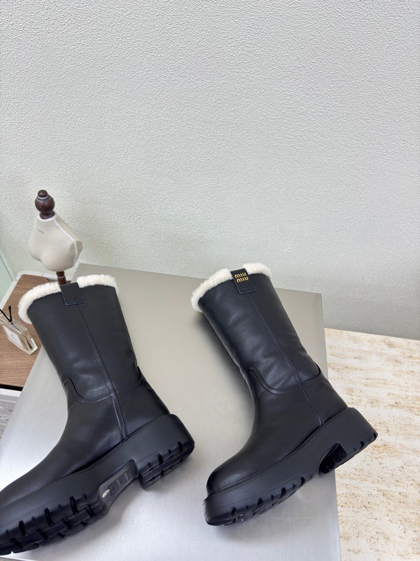 MiuMiu 25 platform boots black calfskin wool 522429