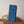 Portafoglio verticale LV Zippy in tela monogramma blu e pelle Taiga 180068