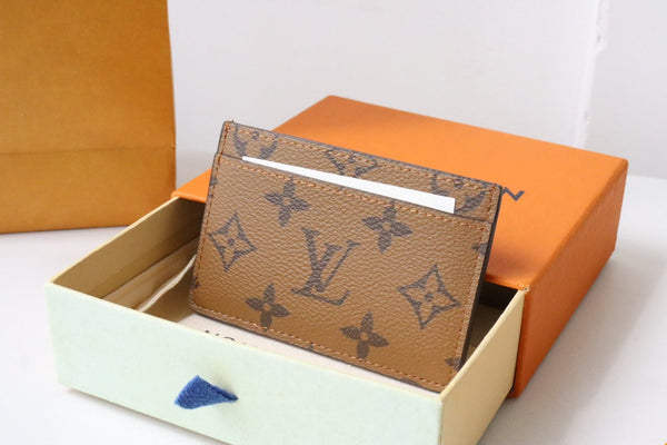 Porta carte di credito LV x SY Dog in tela monogrammata marrone e rossa 204658