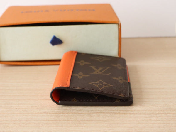 Portafoglio porta carte LV in tela monogramma arancione e pelle di mucca 224115