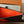 Porta carte con cerniera LV in tela monogramma arancione e pelle di vitello 224125