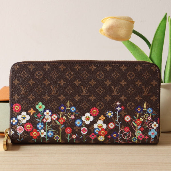 Portafoglio LVxTM Zippy in tela marrone con monogramma e motivi floreali