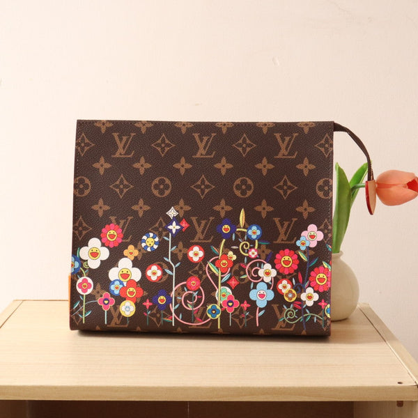 Pochette da toilette LV x TM in tela marrone con monogramma e motivi floreali