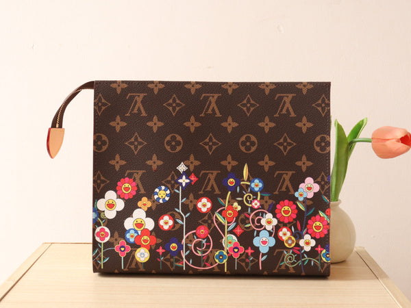 Pochette da toilette LV x TM in tela marrone con monogramma e motivi floreali