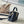CAPUCINES EAST-WEST MINI 22 IN BLACK CALFSKIN GOLD HARDWARE