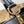 CAPUCINES EAST-WEST MINI 22 IN BLACK CALFSKIN GOLD HARDWARE