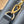 CAPUCINES EAST-WEST MINI 22 IN BLACK CALFSKIN GOLD HARDWARE