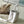 CAPUCINES EAST-WEST 33 IN WHITE CALFSKIN SILVER HARDWARE