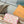 SPEEDY BANDOULIÈRE 20 IN CORAL MONOGRAM TILES CANVAS GOLD BUCKLE